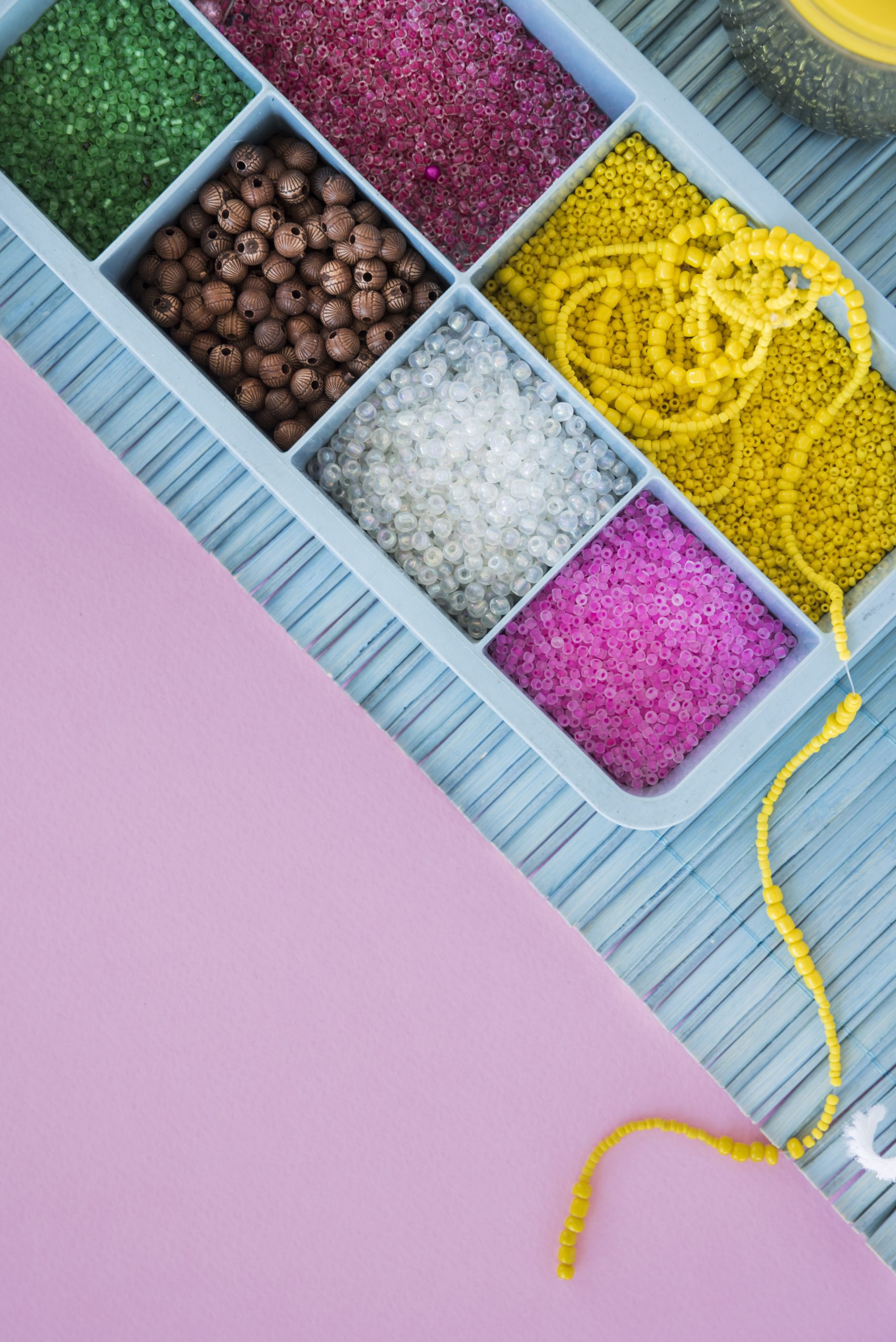 colorful-beads-blue-case-placemat-pink-background