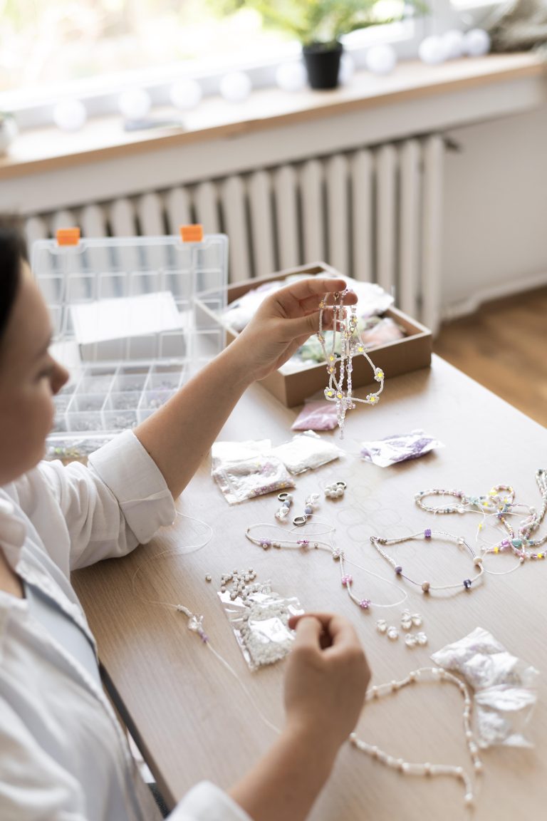 female-artisan-working-with-beaded-necklace