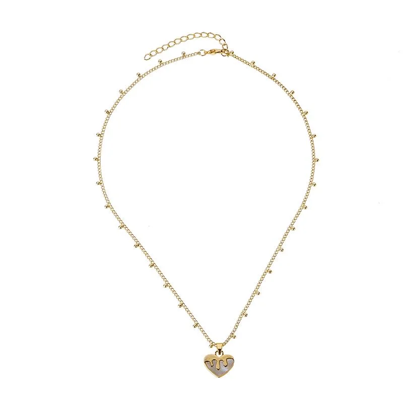 Brass-chain-with-heart-charm-necklace